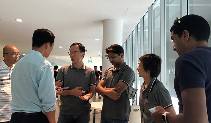 Oi Mei with the research team members