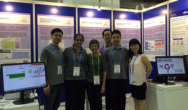 Oi Mei with the research team members
