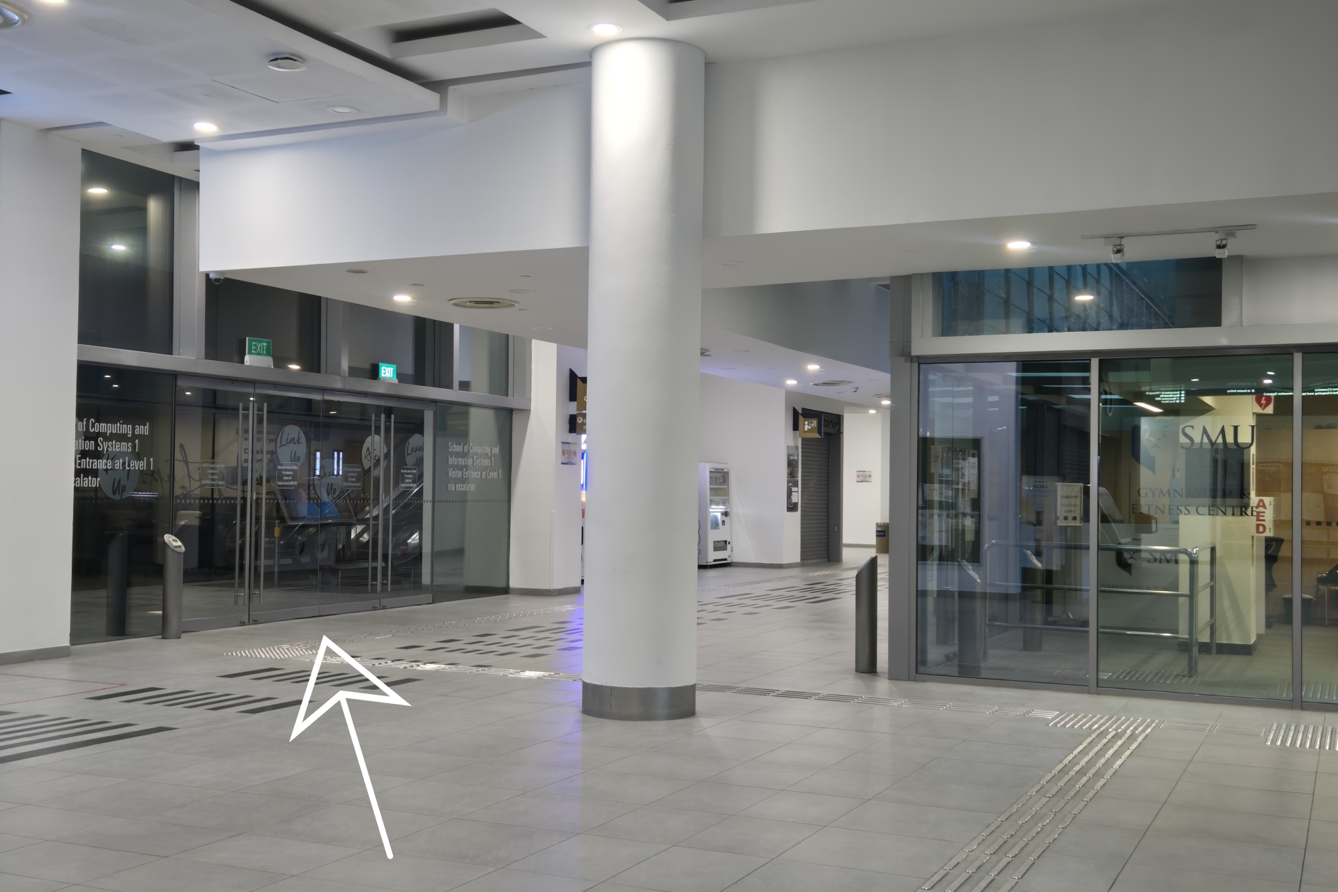 Go towards the glass doors