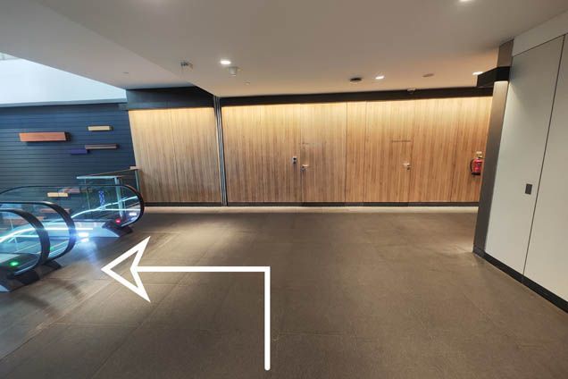 Take the escalator down to B1. At the bottom of the escalator, turn right