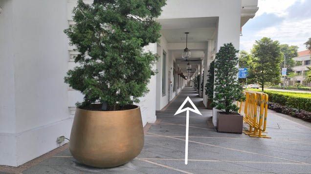 Walk straight to the next traffic light