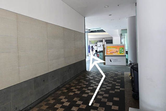 Walk towards the building signage