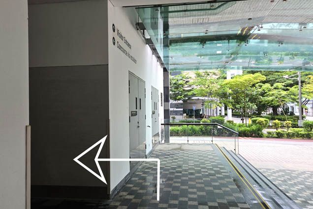 Turn left to the Visitor Entrance