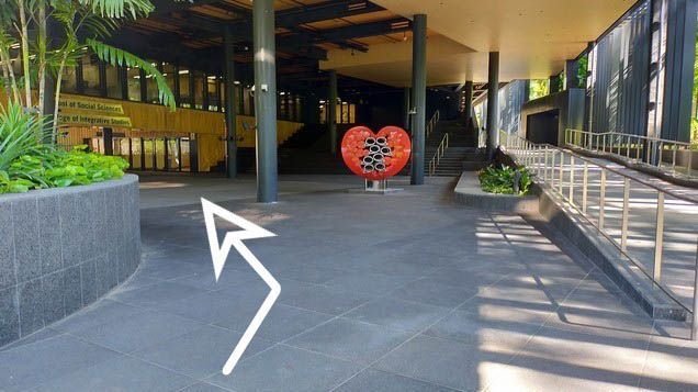 Turn left following the arrow and take the stairs down