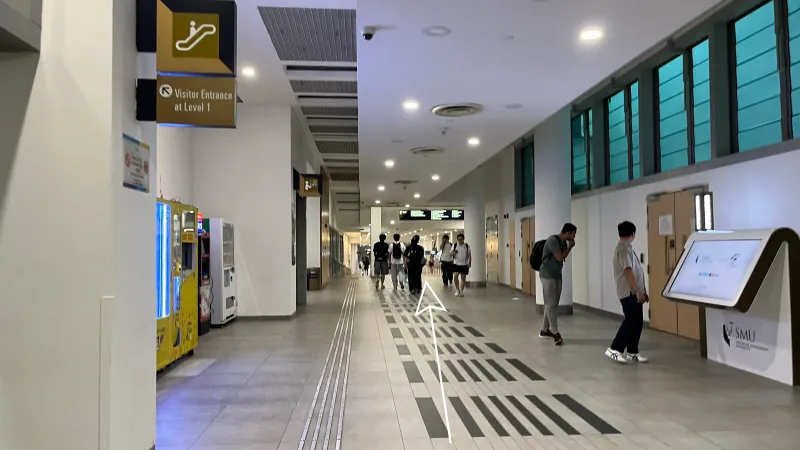 Exit building at street level