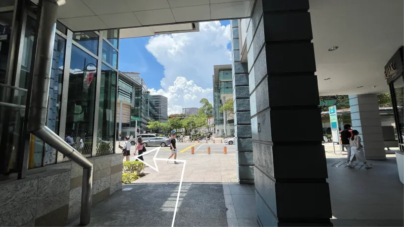 Exit building at street level