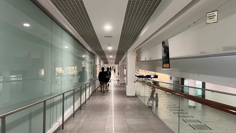 Continue to walk along this corridor